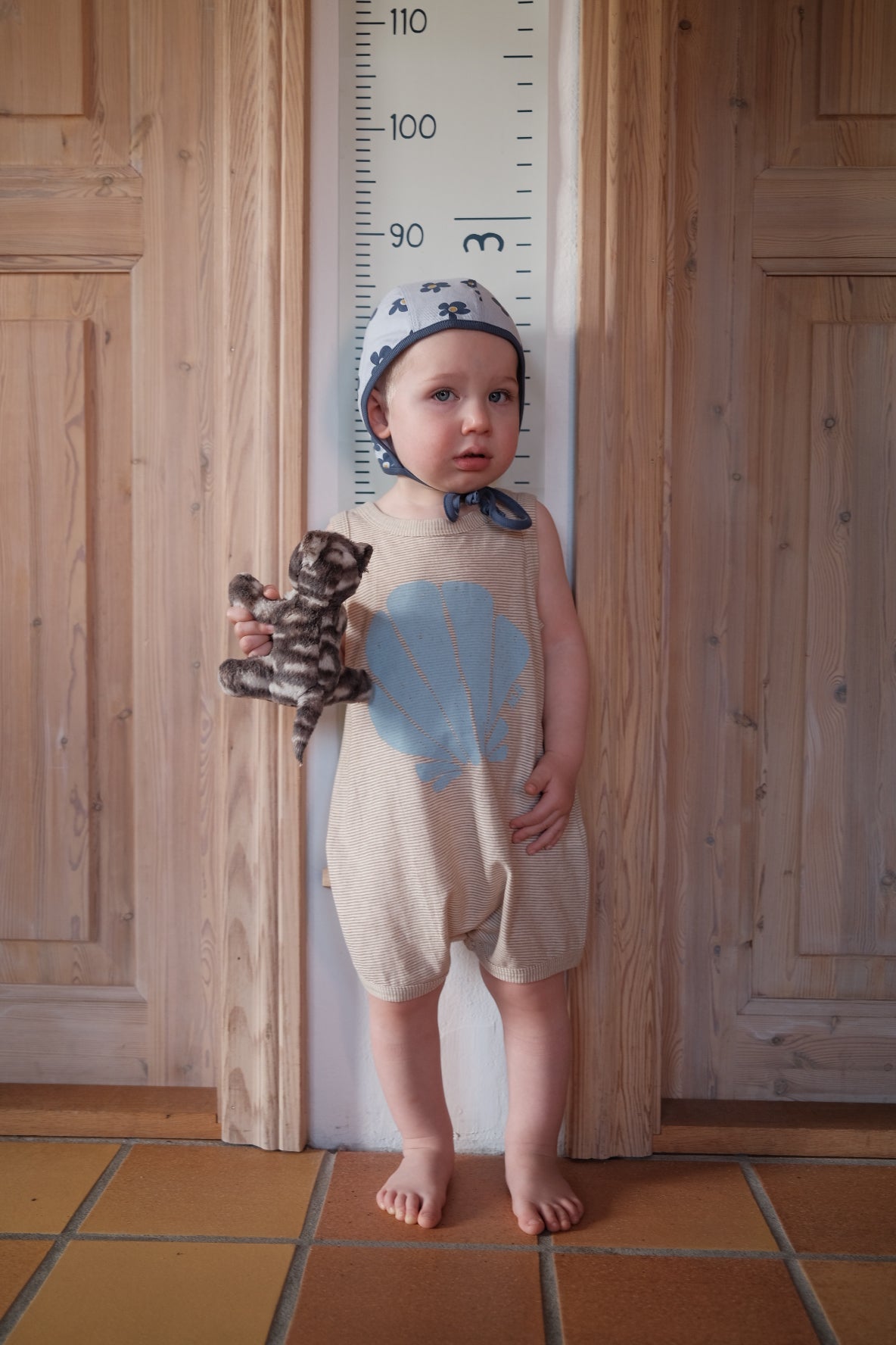 SHELL SLEEVELESS ROMPER – melted butter