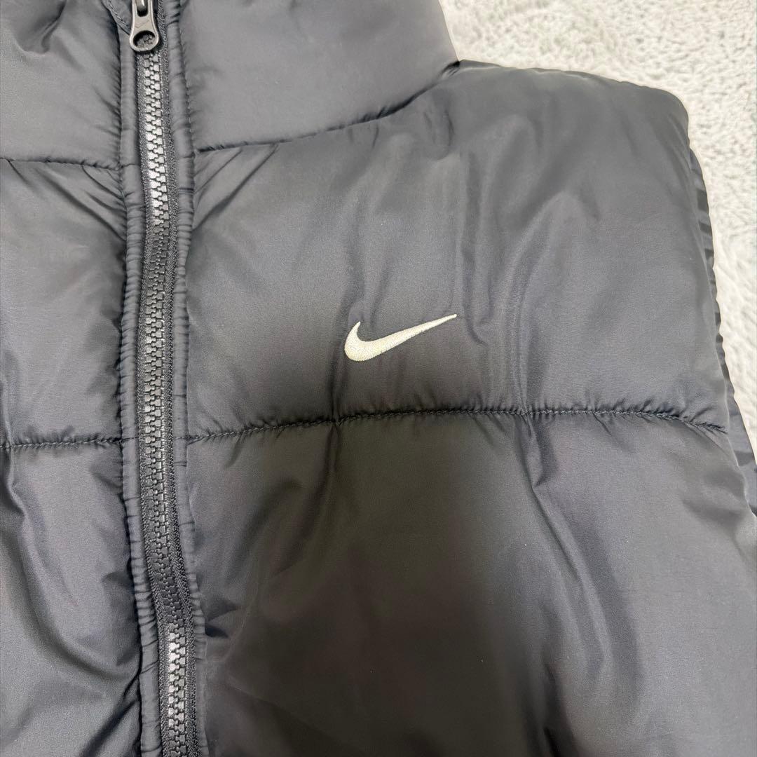 美品】NIKE ブラック ダウンベストS - メルカリ