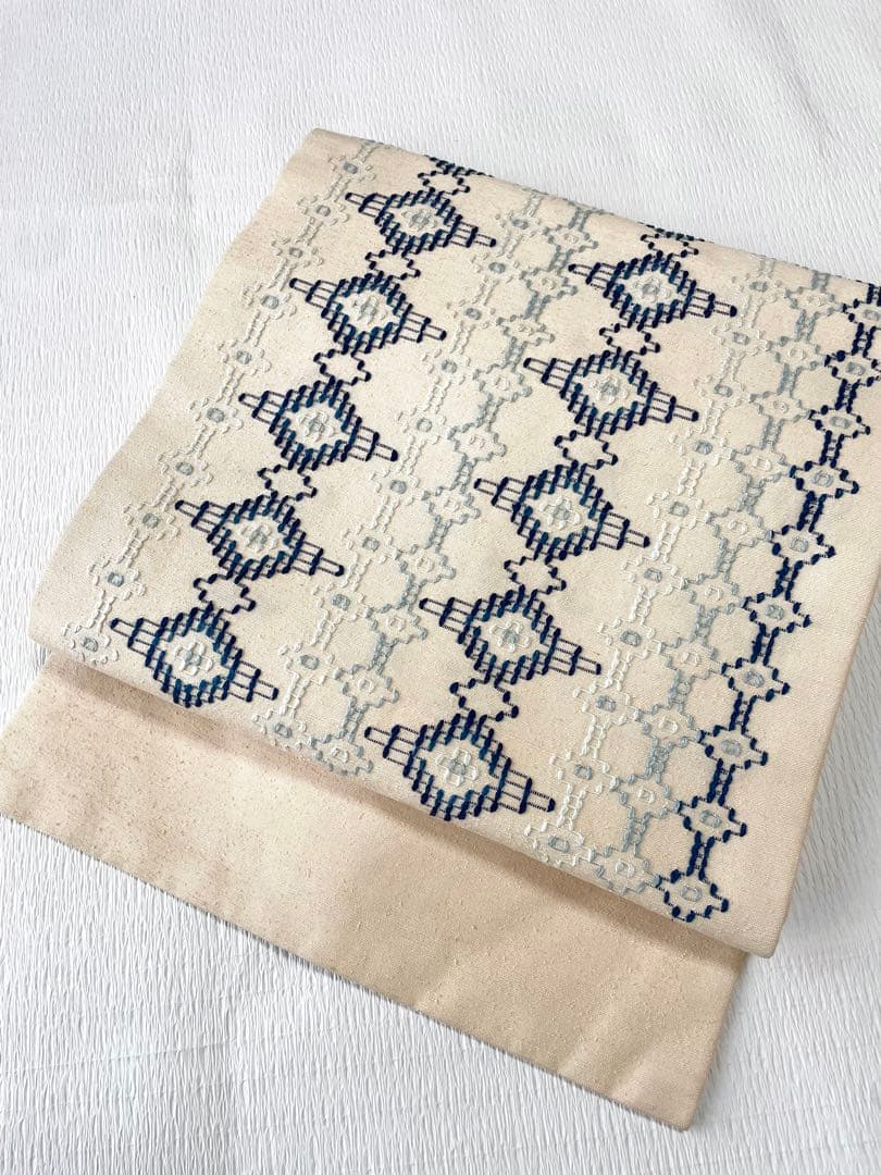 読谷山花織 九寸名古屋帯 上質カジュアルな一本◇本場琉球花織 ベージュ 琉球読谷山花織 九寸名古屋帯 浦さやか ティバナ｜着物専門店