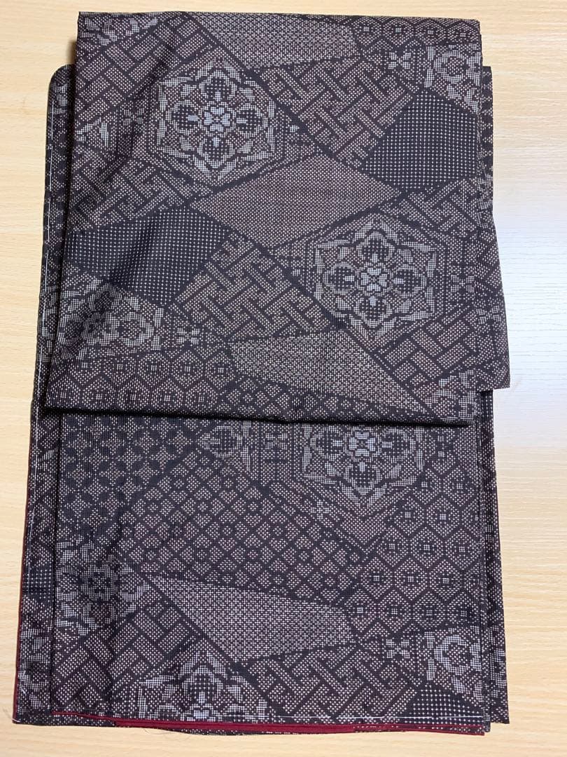 140 正絹　本場泥染大島紬（しつけ有り） 本場大島紬 着物 リサイクル 正絹 大島紬 泥染め 7マルキ こげ茶 雪輪