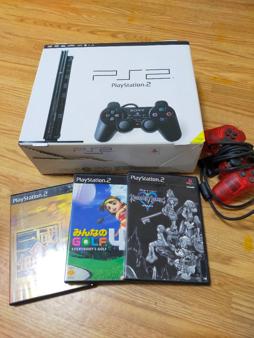 プレステ2薄型+コントローラー+ソフト3 ps2usjyunc23c.jpg
