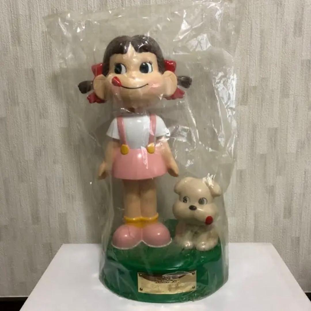 不二家 ペコちゃん シリアルナンバー入り 首振り人形 - メルカリ