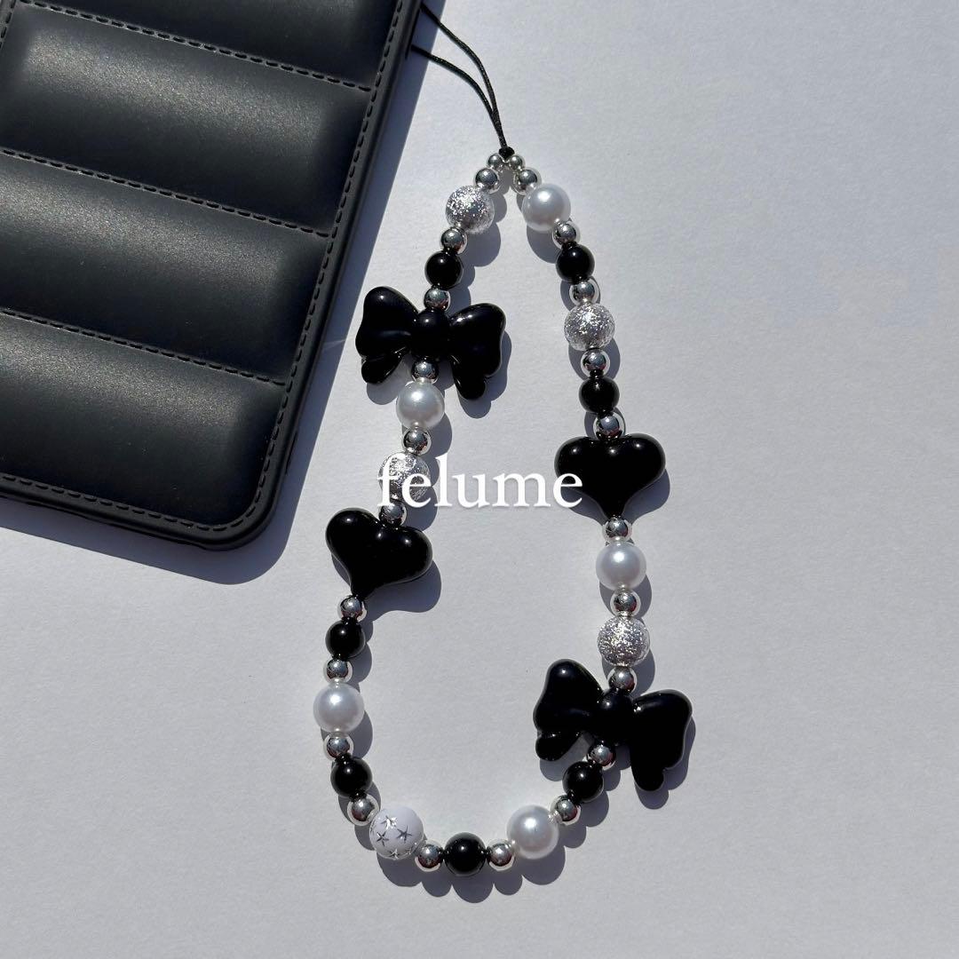 71. ブラックリボン×黒ハート パール ビーズストラップ スマホ