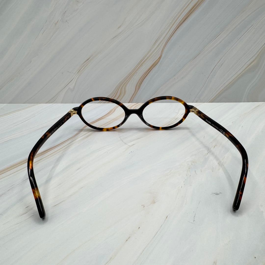 ミュウミュウ】ウォニョン着用 レンズなし 伊達メガネ べっこう柄 ロゴ