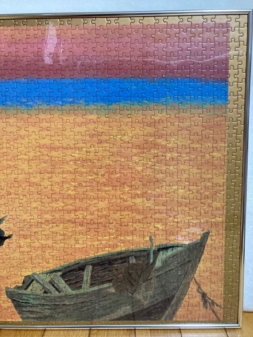 千P⑫夕日にボートと鳥 ジグソーパズル 金属額 長良川の鵜飼？夕暮れに飛ぶ