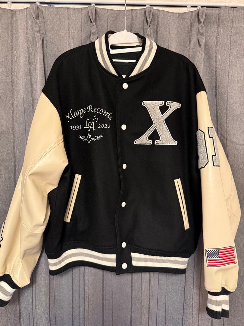 X-LARGE スタジャン ブラック/アイボリー XLARGE（エクストララージ）の「VARSITY JACKET（スタジャン）」 - WEAR