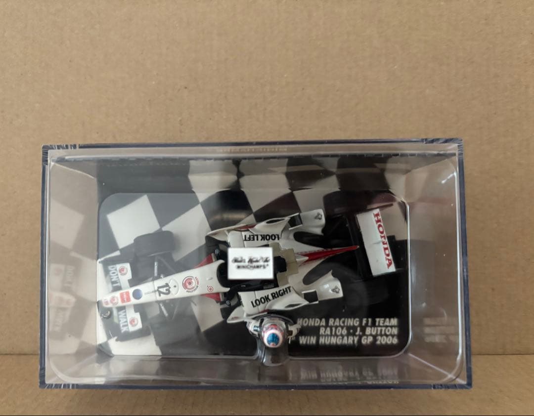ミニチャンプスHONDARACING RA106.J.BUTTON 1 WIN - メルカリ